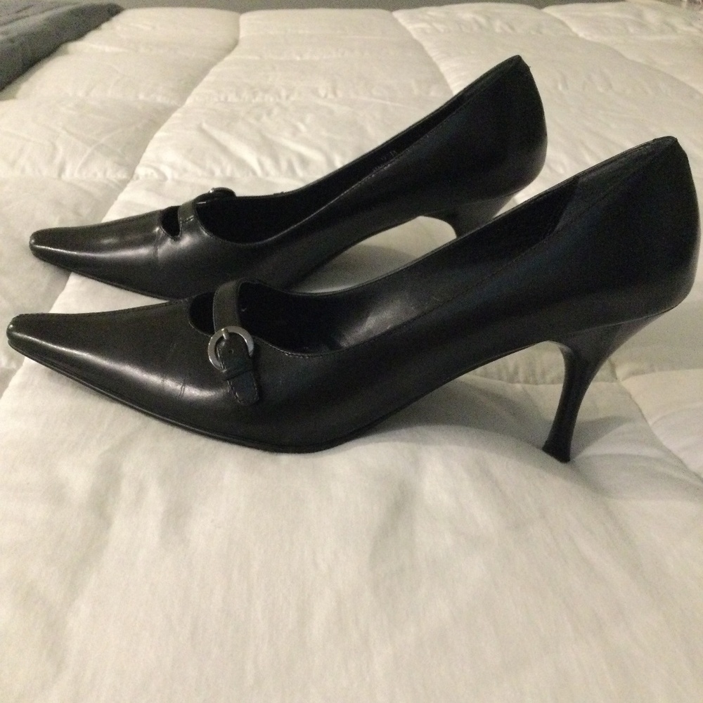 Black high heels, buckle detail